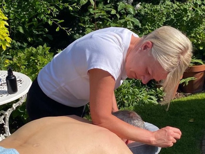 Lisa, sports massage therapist, treating a client